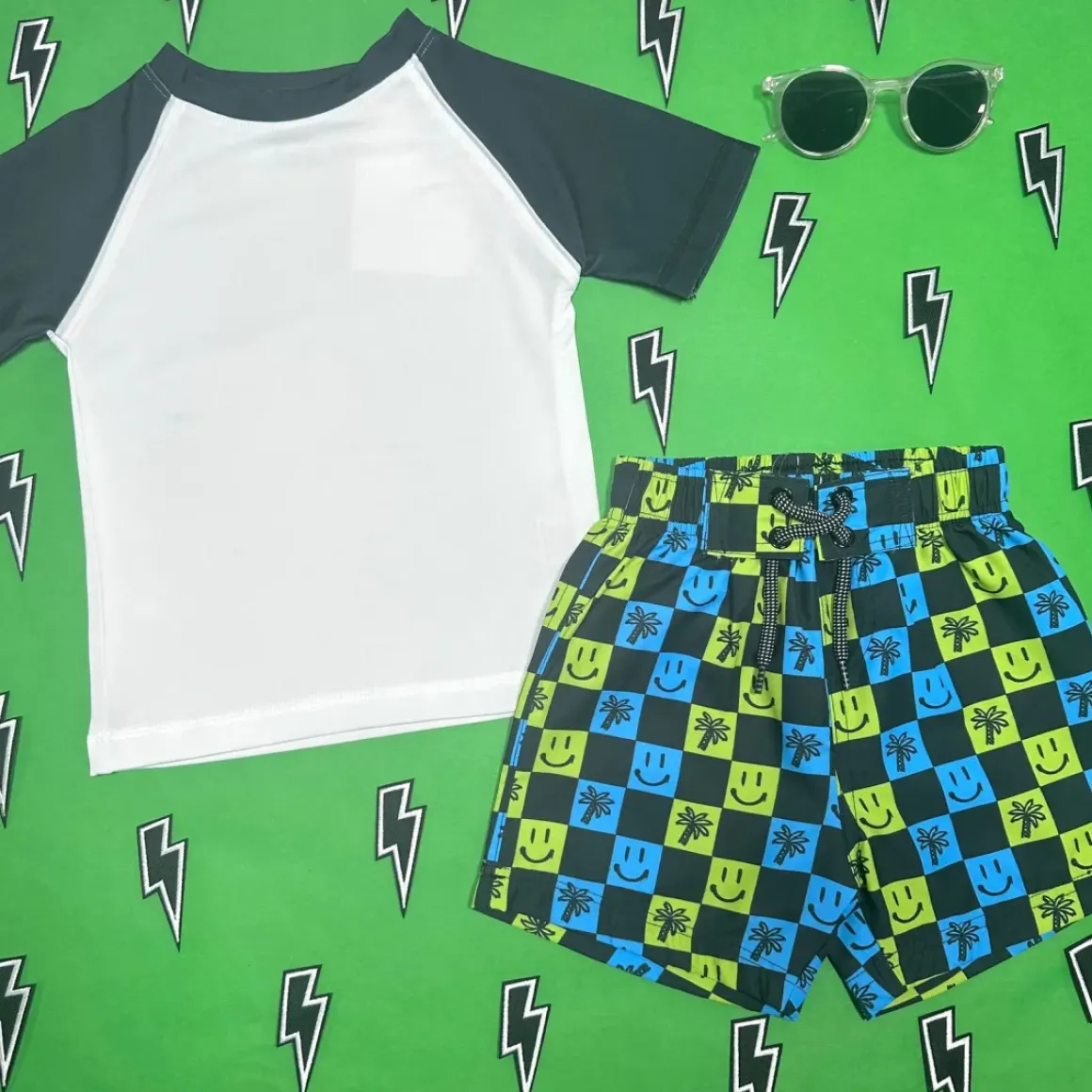 SMILEY FACE & PALM TREES CHECKERED SWIM TRUNKS